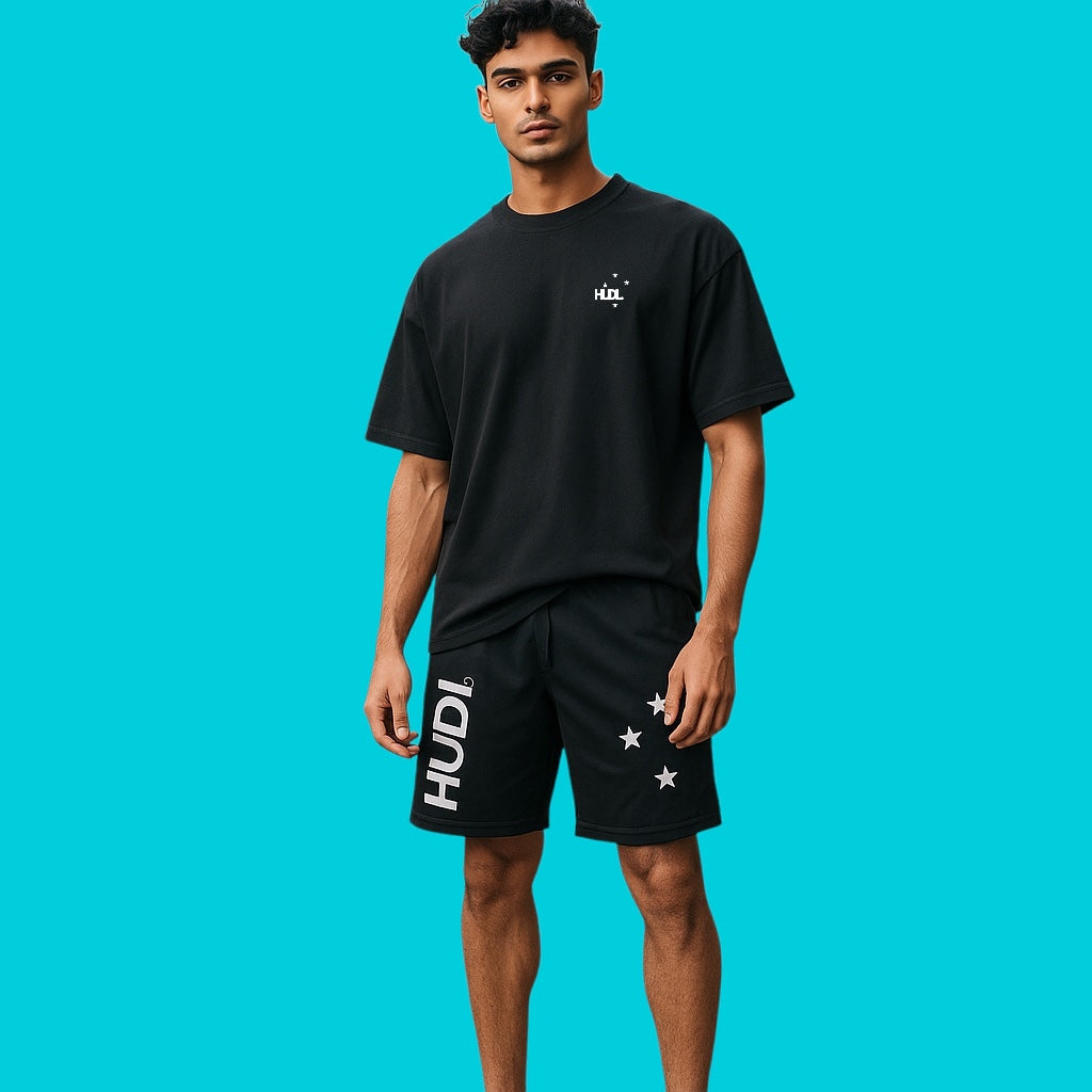 A man wearing HUDL men's squash performance shorts – 2-in-1 design, XTPro moisture-wicking fabric with HUDL SuperNatural squash tee – Cotton-Tencel-Nylon blend, soft performance feel on and off court in black 